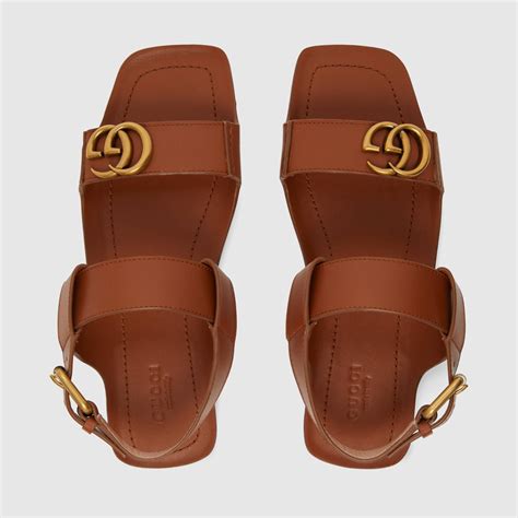 gucci flat leather sandals|latest style for Gucci sandals.